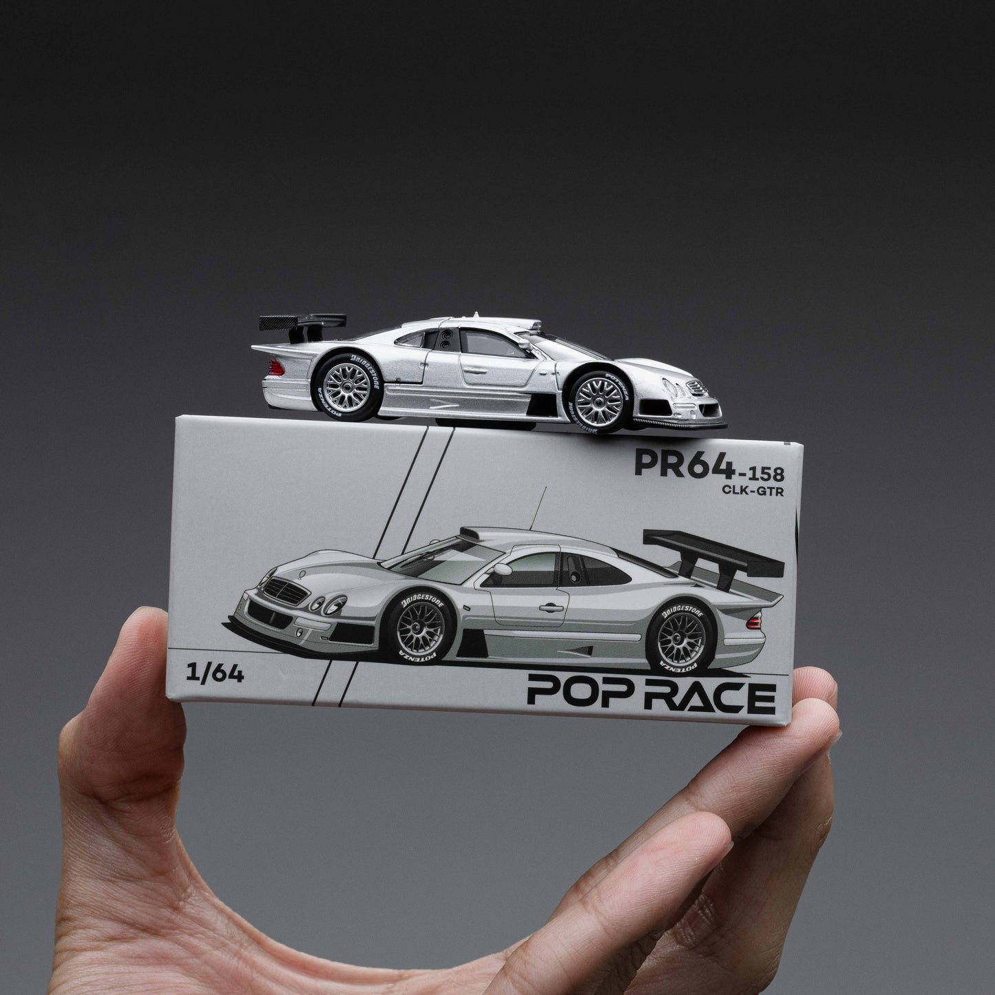 Pop Race 1:64 Mercedes-Benz AMG CLK GTR in Silver
