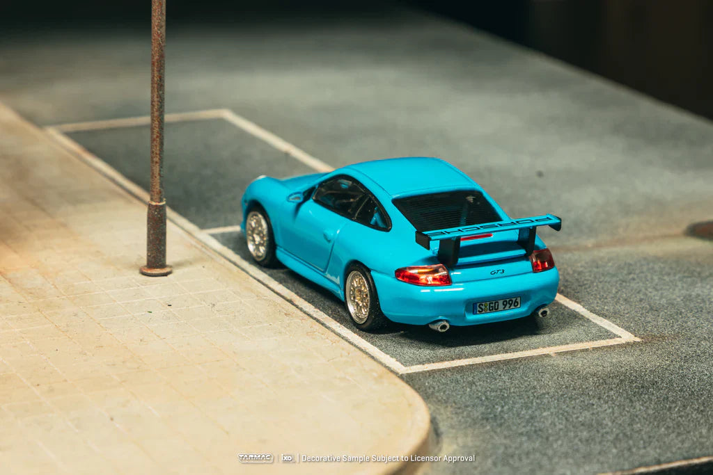 :64 PORSCHE 911 (996) GT3 -- LIGHT BLUE -- TARMAC WORKS X IXO